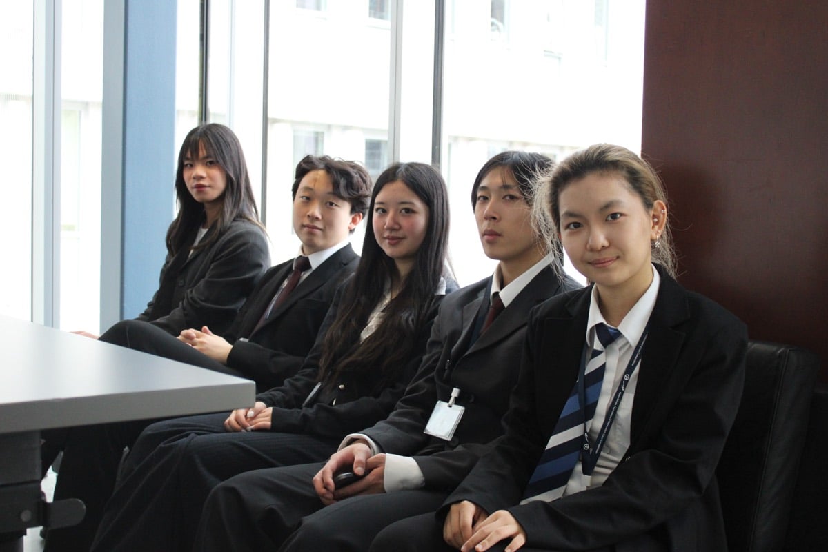 A student team gathered at Momentum Case Competition