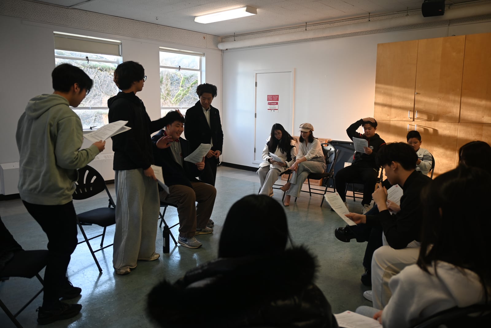 Young people practising their arguments together at the Open Arms mock trial workshop