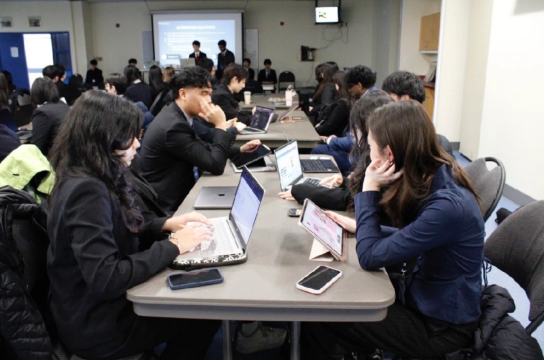 Student teams working together during the INSPIRE Case Competition